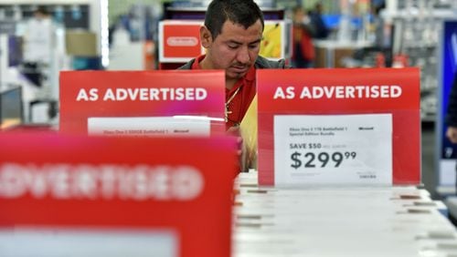 Brick-and-mortar retailers say that legislation introduced in the Georgia House would level the playing field with online retailers who often do not charge state sales taxes. The bill would require major online retailers to either collect and remit to the state sales taxes on purchases or send “tax due” notices each year to customers. Copies of the notices would go to the state Department of Revenue so it would know who owes the money. A state fiscal analysis suggests collecting those taxes could mean an extra $274 million in revenue for the state and $200 million for local governments. The combined figure could hit $621 million by 2022. HYOSUB SHIN / HSHIN@AJC.COM