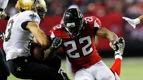ATLANTA, GA - JANUARY 01: Keanu Neal #22 of the Atlanta Falcons forces Willie Snead #83 of the New Orleans Saints to fumble during the second half at the Georgia Dome on January 1, 2017 in Atlanta, Georgia. (Photo by Kevin C. Cox/Getty Images)