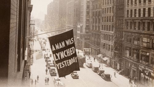 In this undated photo, a flag announcing another lynching flies from the window of the NAACP headquarters at 69 Fifth Ave. in New York. From 1920 to 1940, the NAACP fought unsuccessfully  to persuade Congress to pass an anti-lynching law.  (Library of Congress)