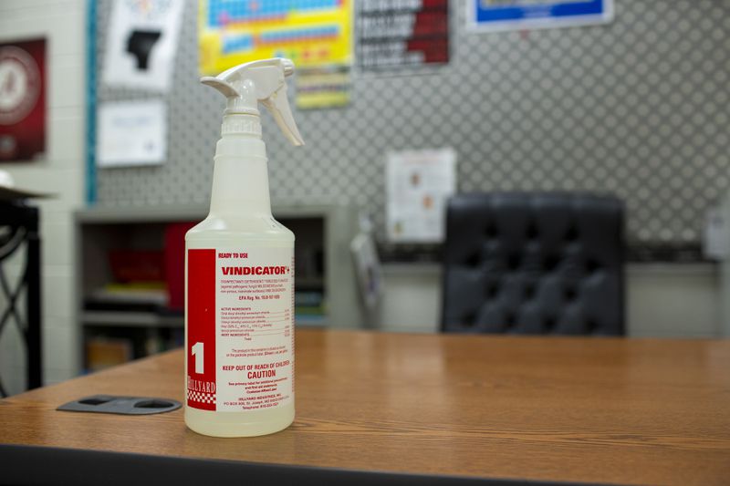 CDC-approved disinfectant Vindicator+ is seen at Northbrook Middle School in Suwanee, Georgia. In late August the Georgia Department of Public Health asked every school in the state to start sending weekly reports about COVID-19 infections, clusters of infections and related quarantines in each school (REBECCA WRIGHT FOR THE AJC)