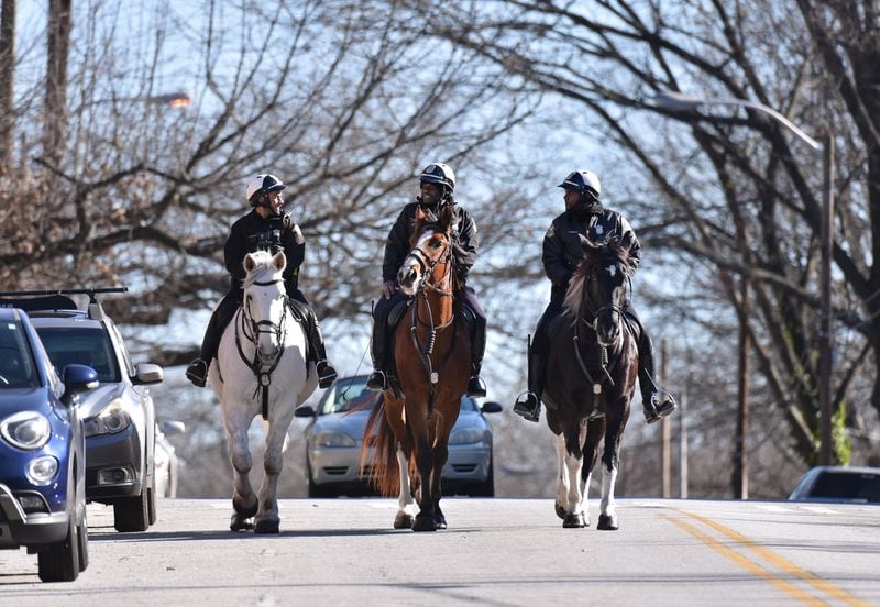From left, Officer Juan Restrepo and his horse Hercules, Officer Joseph Williams and his mount Jasper and Officer Larry Sheppard with Joker patrol the Grant Park neighborhood on January 8, 2020. The Atlanta Police Department mounted patrol unit is part of the APD’s Special Operations Section. (Hyosub Shin / Hyosub.Shin@ajc.com)
