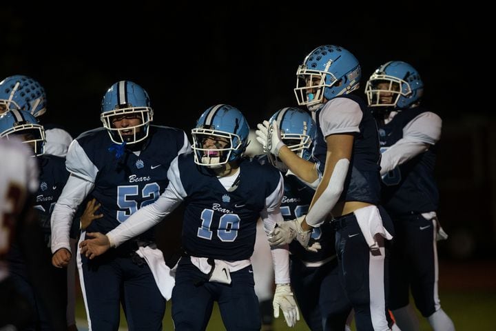Cambridge players celebrate during a GHSA high school football game between Cambridge and South Paulding at Cambridge High School in Milton, GA., on Saturday, November 13, 2021. (Photo/Jenn Finch)