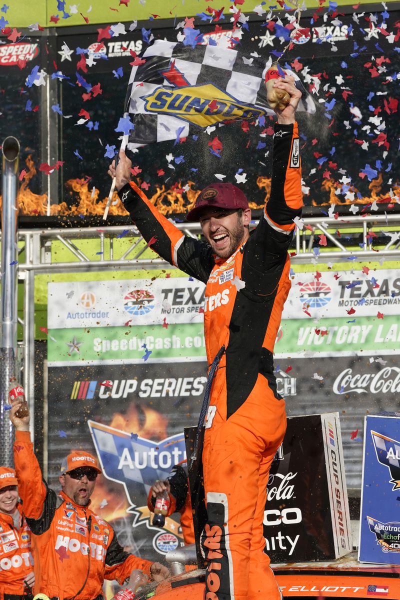 Chase Elliott celebrates after winning a NASCAR Cup Series auto race at Texas Motor Speedway in Fort Worth, Texas, Sunday, April 14, 2024. (AP Photo/Larry Papke)