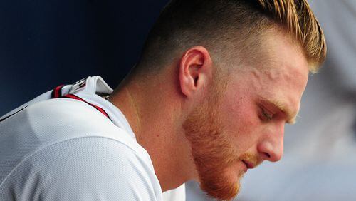 ATLANTA, GA - JUNE 30: Shelby Miller #17 of the Atlanta Braves sits in the dugout during the second inning against the Washington Nationals at Turner Field on June 30, 2015 in Atlanta, Georgia. (Photo by Scott Cunningham/Getty Images)