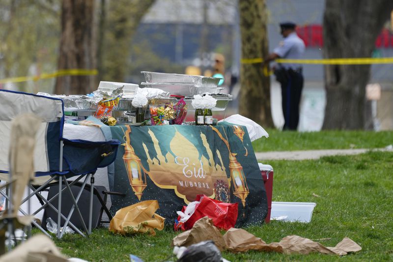Shown are personal items left behind at the scene of a shooting at an Eid al-Fitr event in Philadelphia, Wednesday, April 10, 2024. (AP Photo/Matt Rourke)