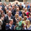 Georgia Gov. Brian Kemp, front left, and first lady Marty Kemp, applaud earlier this month after the governor signed a $36.1 billion budget for fiscal 2025, which begins July 1. (John Spink/Atlanta Journal-Constitution via AP)