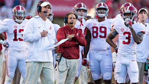 Offensive coordinator Lane Kiffin and coach Nick Saban share some quality time together during this season’s game at Arkansas. (Wesley Hitt/Getty Images)