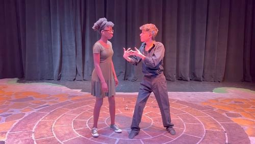 Central Gwinnett students Titilayo Odupolu (left) and Josue Martinez took top honors in the American Sign Language Artistic Expression competition that is part of the National Deaf High School Theatre Festival.