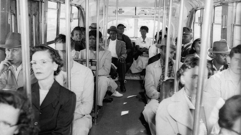 Black and white passengers sit segregated on an Atlanta trolleybus in April 1956. The trolleybus system replaced Atlanta’s original streetcar line, which ended in 1949. (HORACE CORT, ASSOCIATED PRESS FILE PHOTO)
