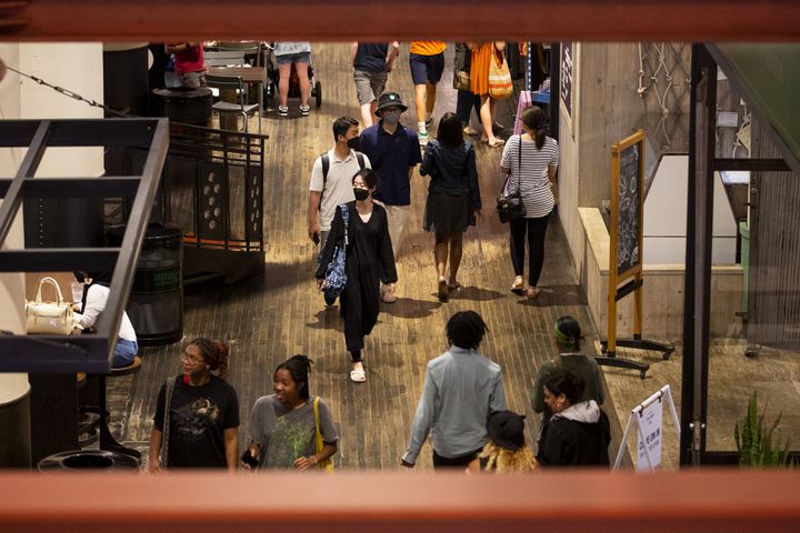 People walk through Ponce City Market both masked and unmasked on Tuesday, July 19, 2022, in Atlanta. (Chris Day/Christopher.Day@ajc.com)