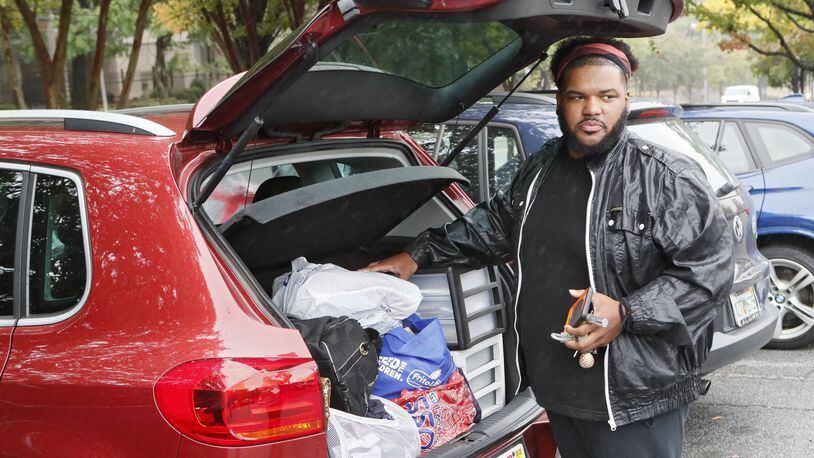 Caleb Webb, 29, has many of his possessions organized in his car. He is homeless and has been staying at friends’ homes and occasionally out of his car. The closure of nonprofit contractor Living Room has left more than two dozen counties in and around metro Atlanta with no central intake for the $23 million Housing Opportunities for Persons with AIDS program. BOB ANDRES / ROBERT.ANDRES@AJC.COM