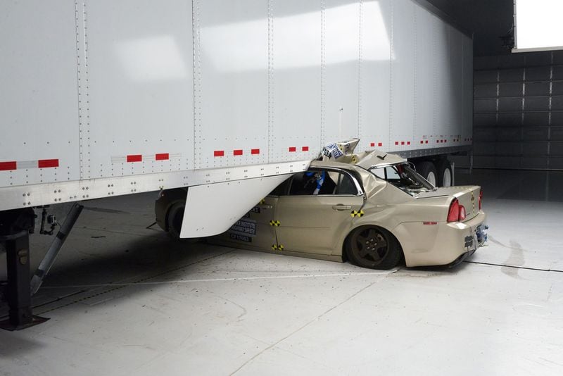  A Chevrolet Malibu underrides a semitrailer in a 35 mph crash test. INSURANCE INSTITUTE FOR HIGHWAY SAFETY via ASSOCIATED PRESS