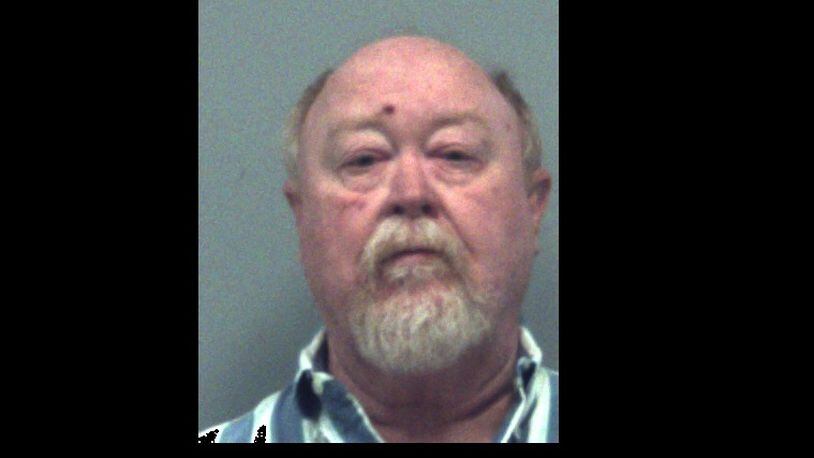 Robert Dennis Money, 62, has been arrested and charged with five counts of possessing child pornography.