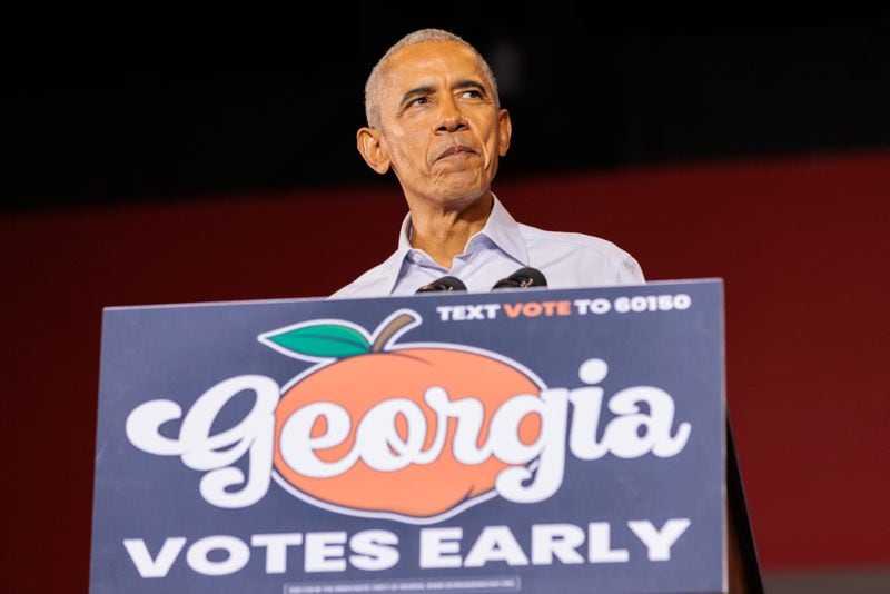 Former President Barack Obama speaks at a campaign event for U.S. Sen. Raphael Warnock and other Democrats in Atlanta on Oct. 28, 2022.  (Arvin Temkar/AJC)