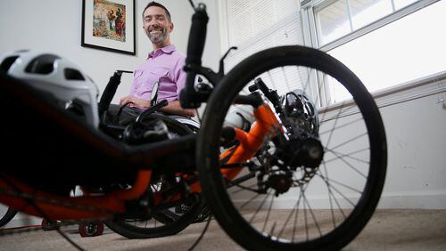 Kyle Bryant, who has Friedreich’s ataxia, a neurodegenerative movement disorder, wrote a book called “Shifting Into High Gear” about his cross-country journey in a recumbent tricycle. Tim Tai/The Philadelphia Inquirer/TNS