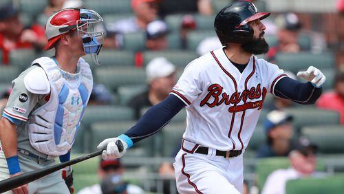 Braves outfielder Nick Markakis hits a sacrifice fly that gave Atlanta a 10-1 lead over Philadelphia in the 6th inning Sunday, June 16, 2019, at SunTrust Park in Atlanta.