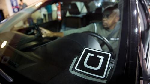 Customers of ride-hailing, taxi and limousine services would pay a 50-cent fee per ride under House Bill 105. The fee for shared rides would be 25 cents. (AJC FILE PHOTO)