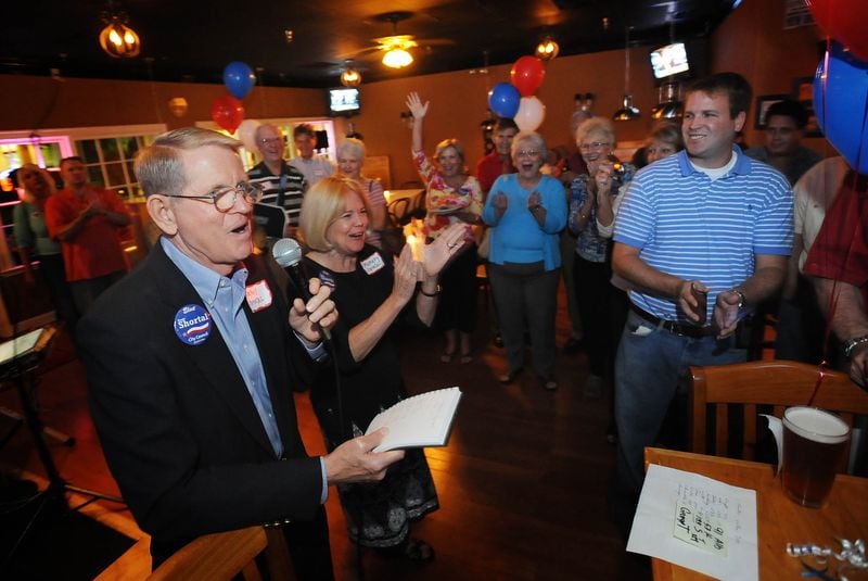 In this photo from 2008, Denis Shortal (left) celebrates his election to the first Dunwoody City Council. He would go on to serve as Dunwoody’s mayor. (Photo: HYOSUB SHIN / hshin@ajc.com)
