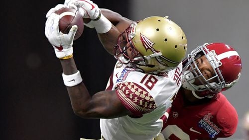 Receiver Auden Tate (18) was a star at Florida State. He signed a one-year contract with the Falcons. (HYOSUB SHIN / HSHIN@AJC.COM)