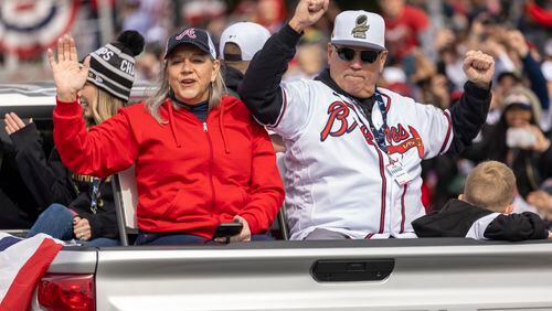 Braves manager Brian Snitker celebrates during the Braves' victory parade in Cobb County, Georgia on November 5th, 2021.