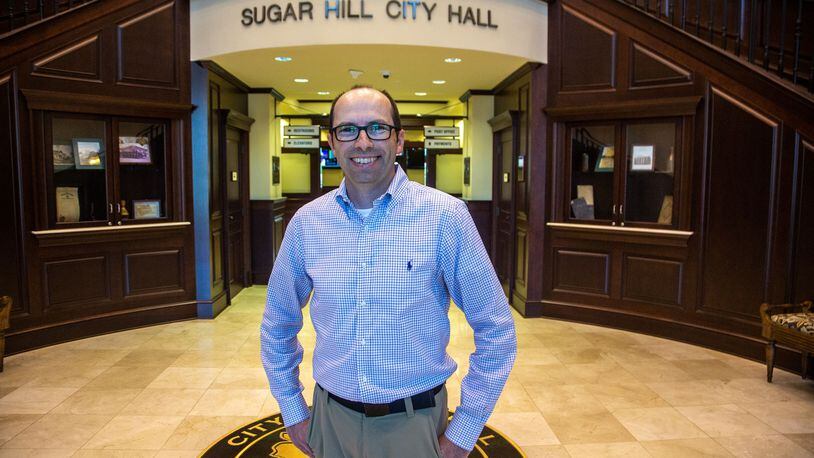 Sugar Hill Mayor Pro Tem Taylor Anderson poses for a photograph at the Sugar Hill city hall on May 21, 2021. STEVE SCHAEFER FOR THE ATLANTA JOURNAL-CONSTITUTION