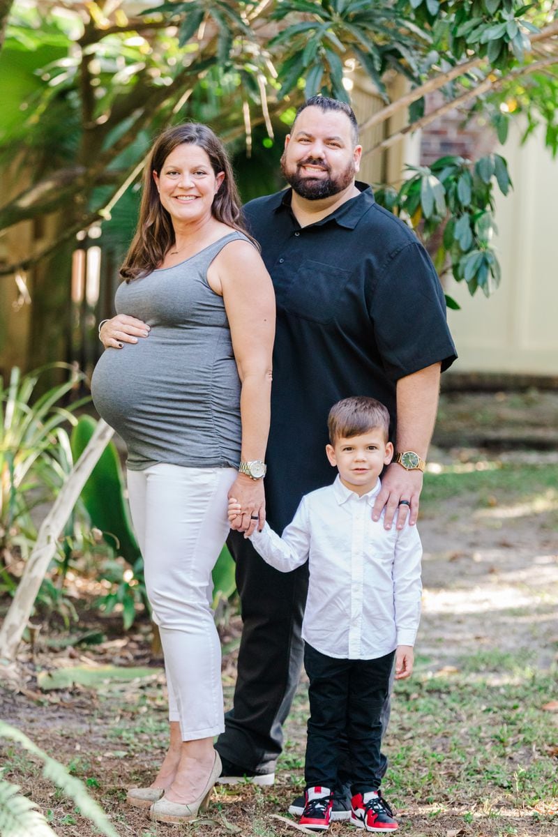 Sabrina Starrett-Wolff with her 
husband, Mike, and son Benjamin days before her COVID-19 diagnosis.  
This counted as their maternity 
photo shoot.