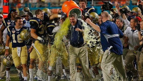 Players dump Gatorade on head coach Paul Johnson of the Georgia Tech Yellow Jackets at the end of the Capital One Orange Bowl game against the Mississippi State Bulldogs at Sun Life Stadium on December 31, 2014 in Miami Gardens, Florida. (Photo by Chris Trotman/Getty Images)