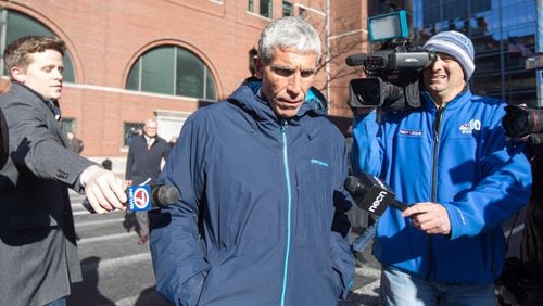 William "Rick" Singer leaves Boston Federal Court after being charged with racketeering conspiracy, money laundering conspiracy, conspiracy to defraud the United States, and obstruction of justice. Singer is  charged in an alleged college admissions scam involving parents, ACT and SAT administrators and coaches at universities including Stanford, Georgetown, Yale, and the University of Southern California.