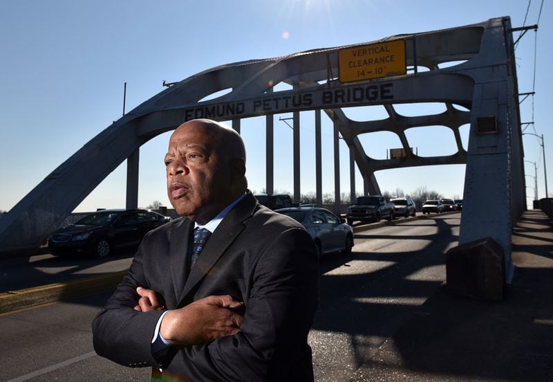 Congressman John Lewis on the Edmund Pettus Bridge February 14, 2015. On March 7, 1965 Hosea Williams and John Lewis led 600 civil rights activists across the Edmund Pettus Bridge in a march for voting rights. Lewis had no idea the level of violence that awaited the group on the other side of the bridge. In what would become known around the country as as Bloody Sunday, state troopers and sheriff deputies used tear gas and clubs to break up the march. Leaving Lewis with a skull fracture and sending more than 50 others to the local hospital for treatment.