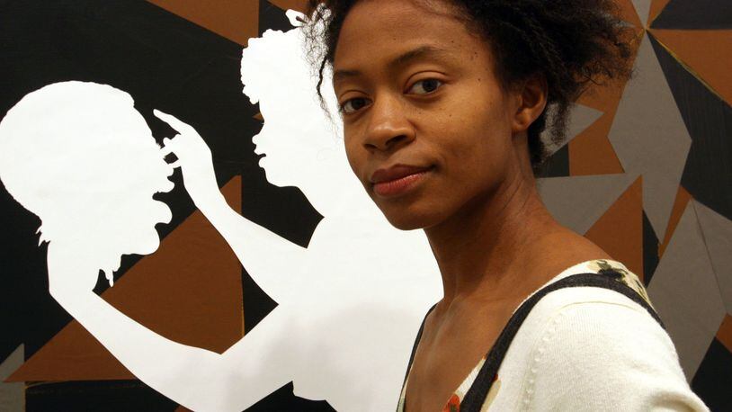 Kara Walker’s “The Jubilant Martyrs of Obsolescence and Ruin,” a 60-foot-wide mural of cut-paper satire, is among the newly acquired works that the High Museum will exhibit this year. TINA FINEBERG / ASSOCIATED PRESS
