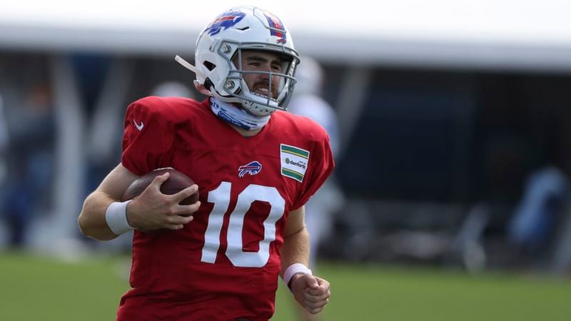 Buffalo Bills rookie quarterback Jake Fromm (10) runs with the ball after catching a pass in a drill during the second day of training camp Tuesday, Aug. 18, 2020, at ADPRO Sports Training Center's outdoor field in Orchard Park, N.Y. (James P. McCoy/Buffalo News)