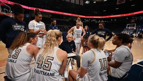 Georgia Tech basketball coach Nell Fortner huddles with her team during an early-season game at McCamish Pavilion. (Georgia Tech Athletics)