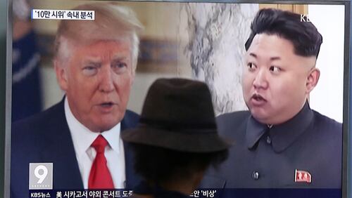 A man watches a television screen showing President Donald Trump and North Korean leader Kim Jong Un during a news program at the Seoul Train Station in Seoul, South Korea, Thursday, Aug. 10, 2017. President Donald Trump issued a new threat to North Korea on Thursday, demanding that Kim Jong Un's government "get their act together" or face extraordinary trouble. He said his previous "fire and fury" warning to Pyongyang might have been too mild.