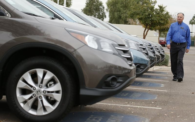 Nationally, tens of millions of used cars are sold each year. (AP Photo/Ross D. Franklin)