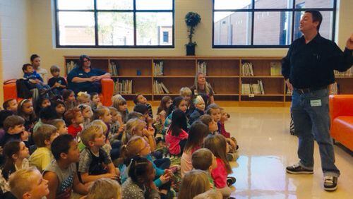 Children’s book author Andy Klein speaks to children during a recent visit and book reading at the media center at Knox Elementary School, Canton. The Cherokee County Schools have approved new measures to improve teaching and learning, particularly in literacy. CHEROKEE COUNTY SCHOOLS
