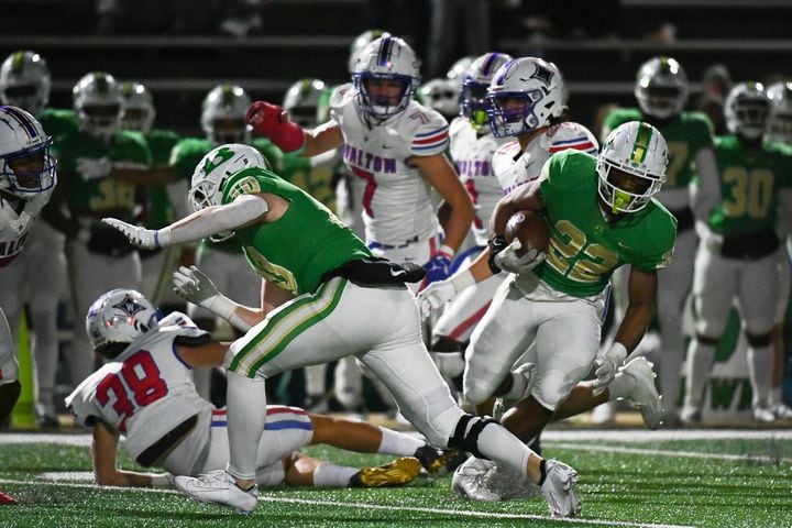 Justice Haynes, running back for Buford, runs for a first down. (Jamie Spaar for the Atlanta Journal Constitution)
