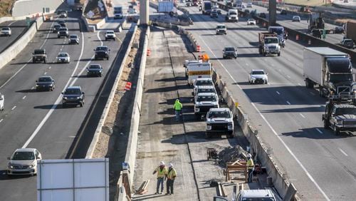 Georgia officials are looking for a long-term way to pay for road construction. Gas tax receipts are expected to decline in coming decades as fuel efficiency increases and more people drive electric vehicles. (File photo by John Spink / John.Spink@ajc.com)