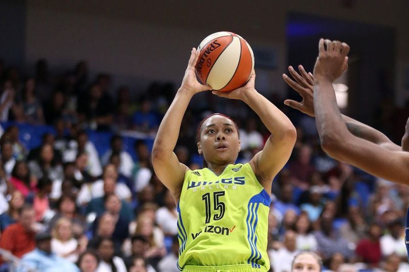 Allisha Gray pulls up for a shot for the Dallas Wings. She averaged  13 points a game on the way to being named the WNBA's rookie of the year . (Layne Murdoch/NBAE)