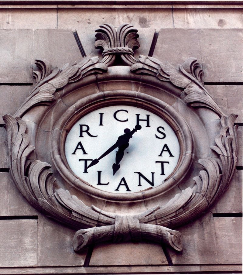 Detail of the clock on the exterior of the downtown Rich's building, taken in 1991. The back cover of Celestine Sibley's "Dear Store" included a photo of the clock and this quote from Atlanta journalist (and poet) Ollie Reeves: "Very often when a fellow asks his best girl for a date they will meet at Rich's corner, where a lot of people wait.... For the homefolks of Atlanta, there is something very dear in this old-time institution with its friendly atmosphere." The clock remained when the store site was redeveloped for the Sam Nunn Atlanta Federal Center . FILE PHOTO