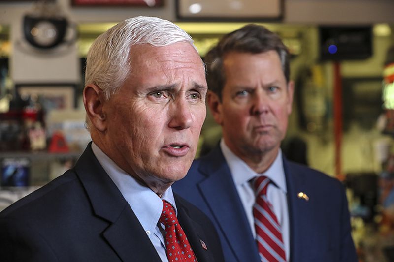 Former Vice President Mike Pence, left, became the most recent member of the GOP establishment to back Gov. Brian Kemp. It's Pence's most significant split yet with his onetime boss, former President Donald Trump, who encouraged former U.S. Sen. David Perdue to launch a primary challenge against Kemp. (Photo: JOHN SPINK/JSPINK@AJC.COM)