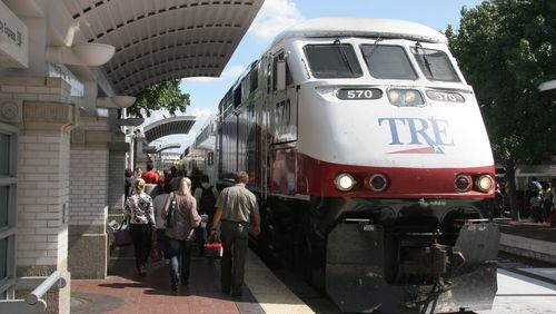 Riders board a Dallas-to-Ft. Worth commuter train in 2012 at Dallas’ downtown Union Station, where heavy rail and light-rail lines intersect. The conservative Dallas metroplex has invested heavily in rail transit to relieve road congestion.