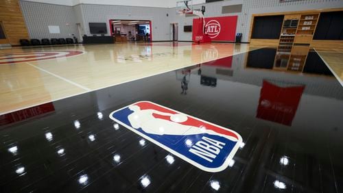 The NBA logo is shown on the main court at the practice facility in the Brookhaven area, Thursday, May 16, 2024, in Atlanta. (Jason Getz / AJC)