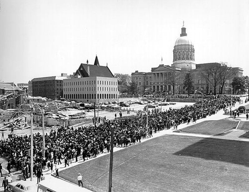 Atlanta, Ga: Rev. Martin Luther King, Jr. funeral passes in front of Atlanta city hall near the Georgia state capitol building April 6, 1968.