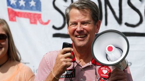 9/29/18 - Athens - Brian Kemp, Republican candidate for Governor, campaigns at a young Republicans tailgate party.  The University of Georgia's football season has attracted candidates. Brian Kemp invokes the team seemingly every chance he gets, with constant talk of "chopping wood" and other slogans from coach Kirby Smart.  Democrat John Barrow gets in on the action, too, holding tailgates from his Athens home.  BOB ANDRES  /BANDRES@AJC.COM