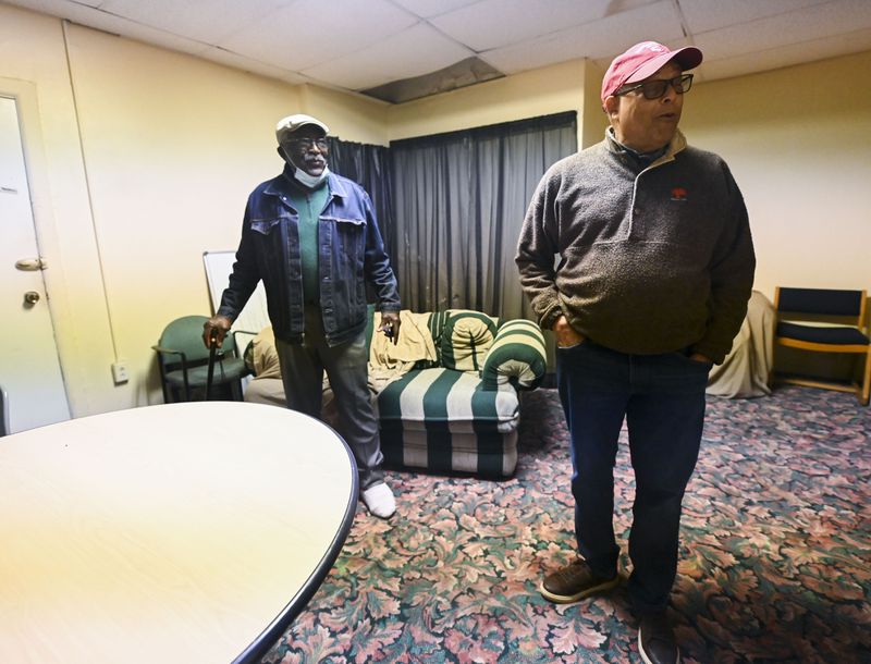 Edward Driver (left) and Edward Bowen (right) stand in the room that was once used by the Rev. Martin Luther King Jr. in 2021. The room is located in The Prince Hall Masonic Lodge on Auburn Avenue. (Daniel Varnado/ For the Atlanta Journal-Constitution)