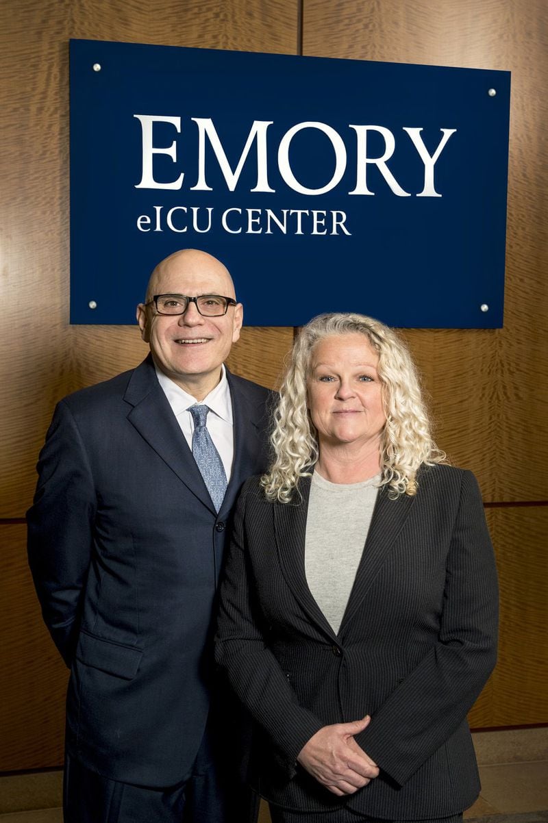 Dr. Tim Buchman, director of the Emory Critical Care Center, and Cheryl Hiddleson, a registered nurse and director of the Emory eICU (electronic intensive care unit). CONTRIBUTED BY JACK KEARSE HEALTH SCIENCES PHOTOGRAPHY