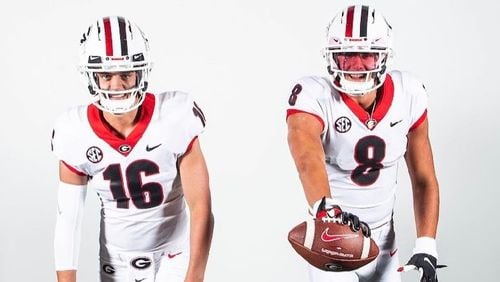 Georgia prospects Arch Manning and Pearce Spurlin lll model some new prototype Bulldogs uniforms during their recruiting visits to Athens last weekend.
