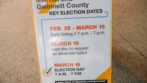 A sign indicating the MARTA and Gwinnett County transit referendum voting calendar is displayed at the Doraville MARTA Transit Station in Doraville in the days leading up to the vote. ALYSSA POINTER/ALYSSA.POINTER@AJC.COM)