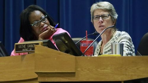 The DeKalb County Board of Commissioners approved a $1.38 billion midyear budget Tuesday. Pictured are Commissioners Mereda Davis Johnson and Kathie Gannon. BOB ANDRES / BANDRES@AJC.COM.