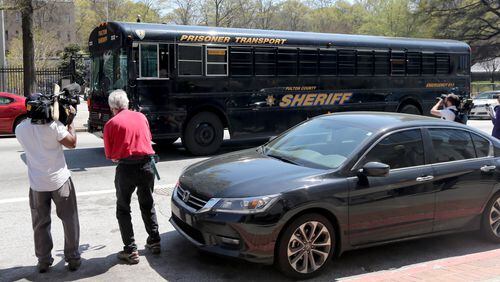 April 1, 2015 Atlanta: The prisoner transport bus believed to be carrying the convicted Atlanta Public Schools educators leaves court in route to the jail following the trial Wednesday afternoon April 1, 2015. Ben Gray / bgray@ajc.com